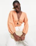[ASOS DESIGN] ASOS DESIGN linen top with lace up front & volume sleeve in peach-Orange 4 Peach