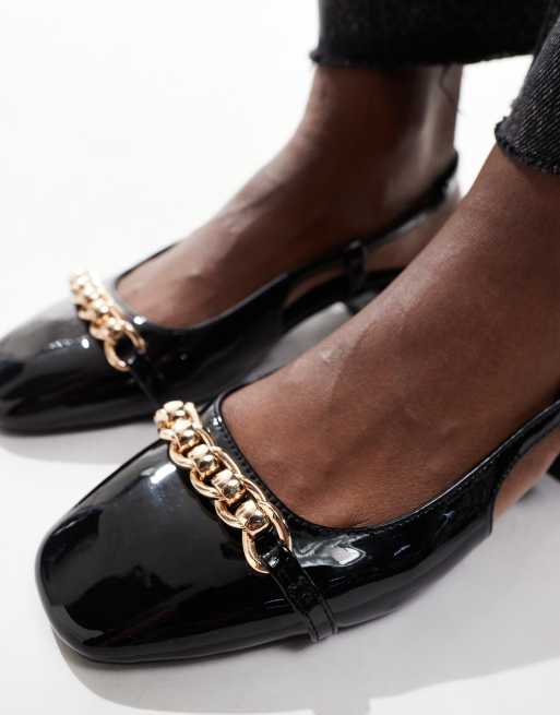 Glamorous black chunky flat shoes with shops gold lion trim