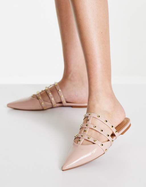 ASOS DESIGN Liquorish studded flat mules in beige patent ASOS