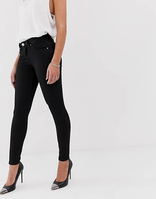 ASOS DESIGN lisbon mid rise 'skinny' jeans in clean black in ankle grazer length