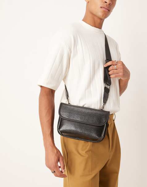ASOS DESIGN lizard faux leather crossbody bag in black - view 1