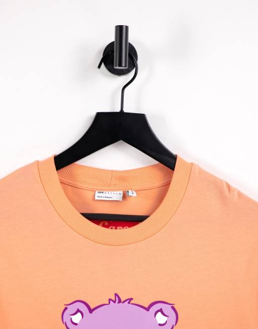 ASOS DESIGN – Lizenziertes Oversize-T-Shirt in Koralle mit <em>Glücksbärchis</em>-Print, 3 von 4