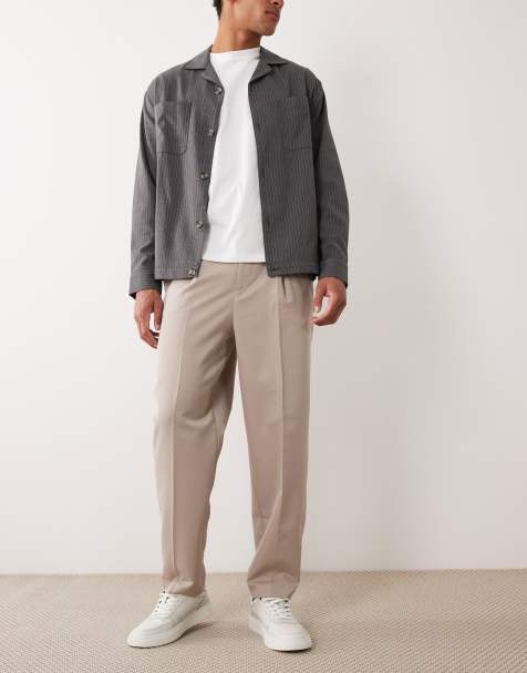 ASOS DESIGN – Ljusbeige, avslappnade finbyxor med avsmalnande passform och veck - view 1