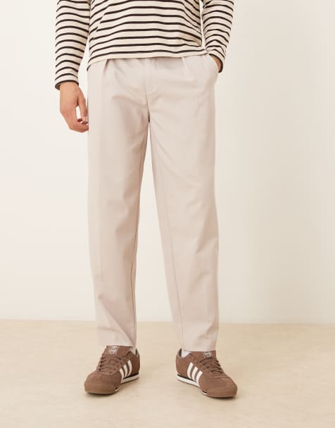 ASOS DESIGN – Ljusbeige, avsmalnande, figursydda byxor i oversize - view 1