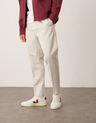ASOS DESIGN – Ljusbeige, avsmalnande finbyxor med resårmidja - view 1