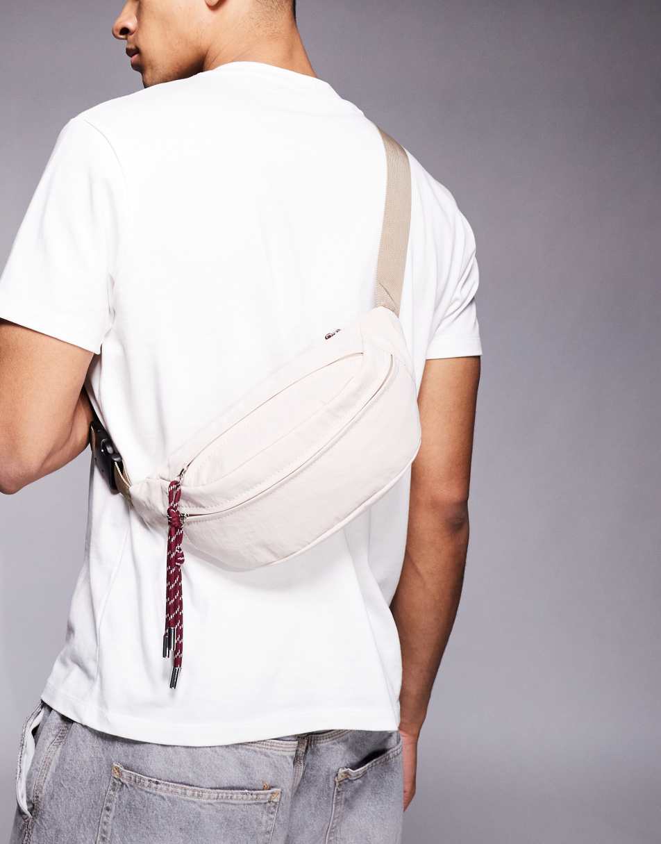 ASOS DESIGN – Ljusbeige magväska med kontrastfärgade dragflikar i nylon - view 1