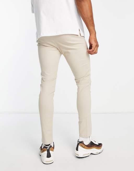 ASOS DESIGN – Ljusbeige och marinblå chinos i extra smal passform, 2-pack Spara, 2 av 4
