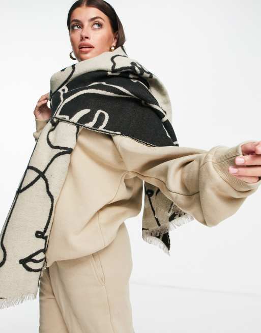 ASOS DESIGN – Ljusbeige och svart jacquardvävd halsduk med abstrakt ansiktsmönster, 2 av 4