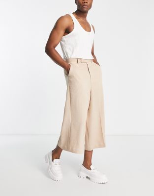 FhyzicsShops DESIGN – Ljusbeige plisserade dressade culotte-byxor med extra vida ben