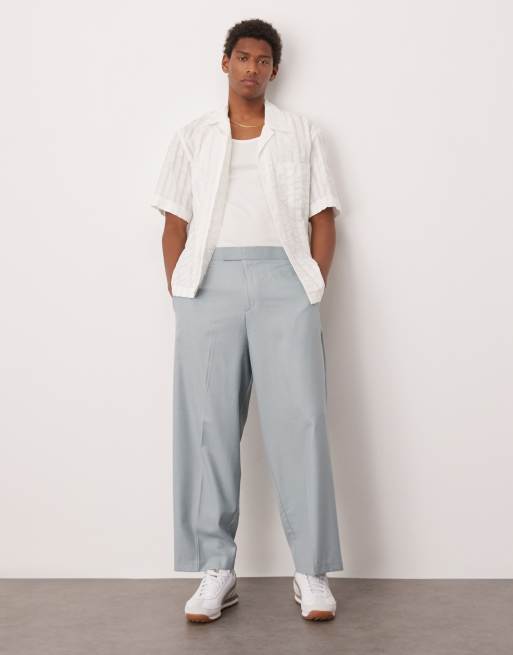 ASOS DESIGN – Ljusblå kostymbyxor i dra på-stil med ballongben, del av kostym