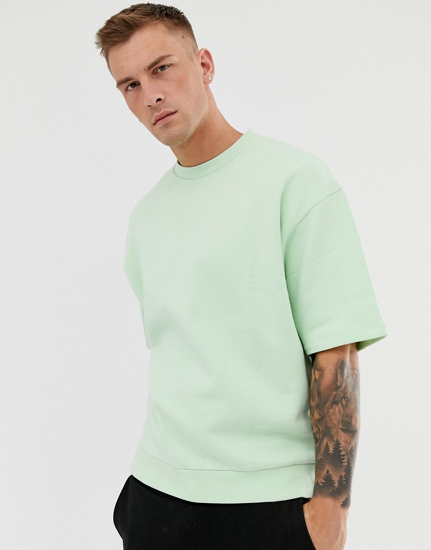 ASOS DESIGN – Ljusgrön, kortärmad sweatshirt i oversize-modell