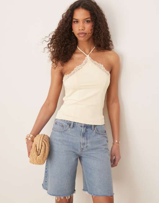 ASOS DESIGN – Ljusgul, åtsmitande topp med halterneck och spetskant