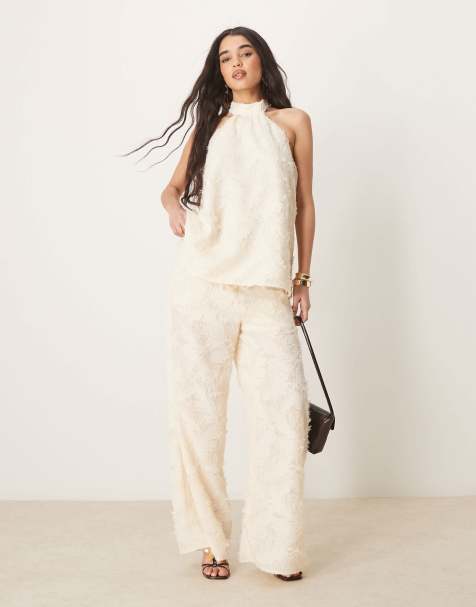 ASOS DESIGN – Ljusgul, figursydd topp med halterneck och textur, del av set - view 1