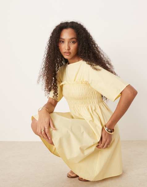 ASOS DESIGN – Ljusgul, smockad miniklänning i babydoll-modell - view 1