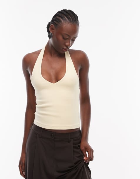 ASOS DESIGN – Ljusgul topp i kompakt bomull med halterneck - view 1