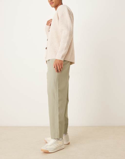 ASOS DESIGN – Ljust kakigröna, avslappnade, avsmalnande byxor med veck, 3 av 5