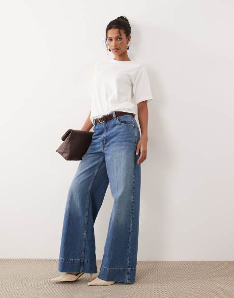 ASOS DESIGN – Ljustvättade jeans med vida ben, veck framtill och skärp - view 1