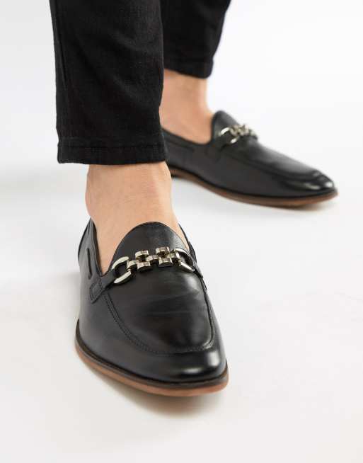 black loafers with design