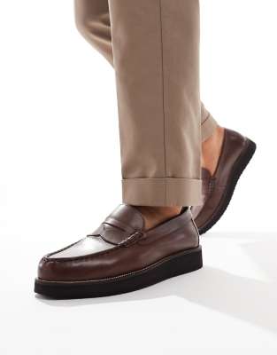 loafers in brown leather with black sole