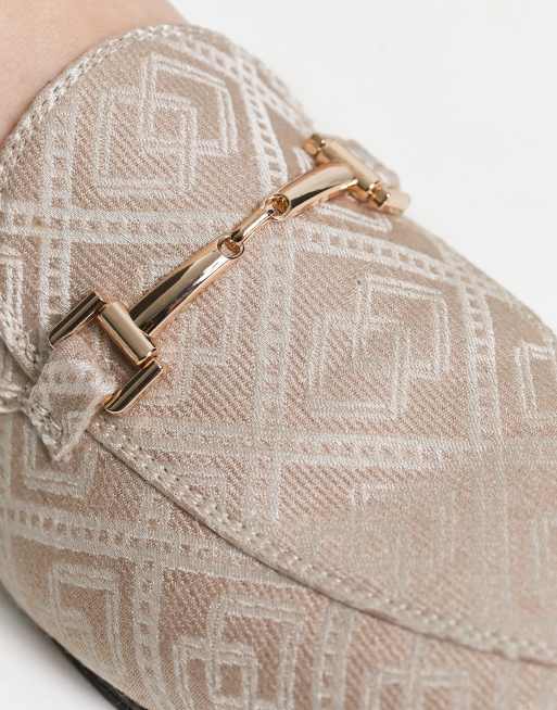 ASOS DESIGN slip on sandals in brown monogram print