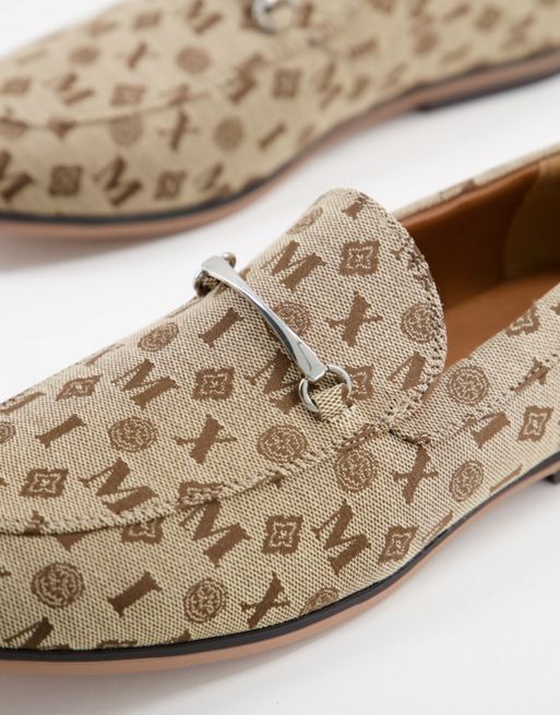 ASOS DESIGN slip on sandals in brown monogram print