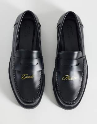  loafers with embossed text and cleated sole 