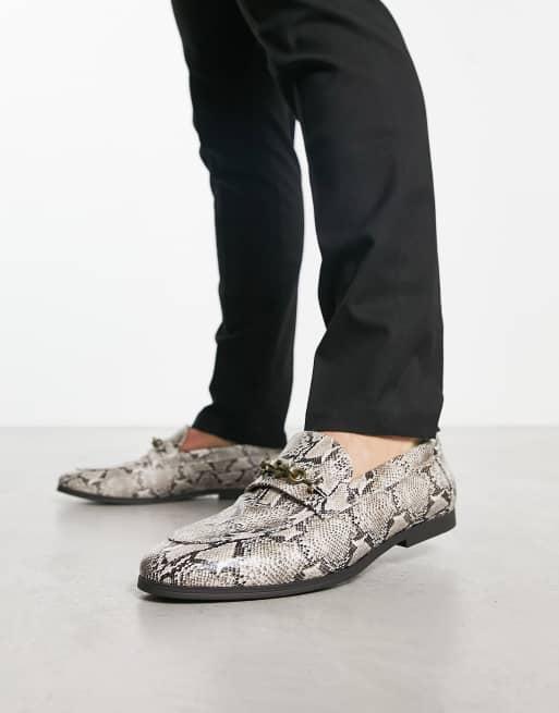 Snake slip on store shoes