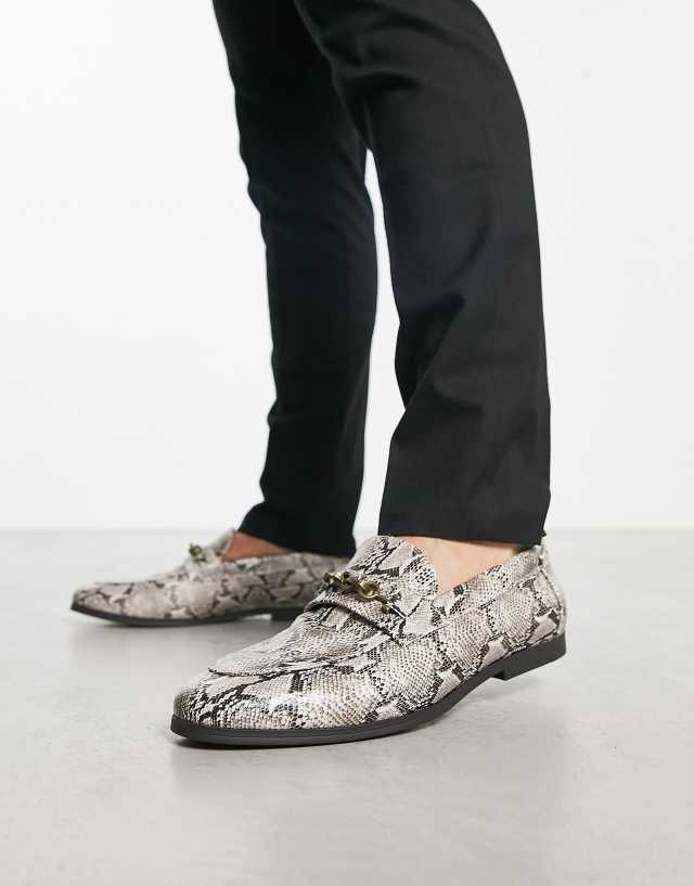 ASOS DESIGN loafers with snaffle detail in snake print faux leather