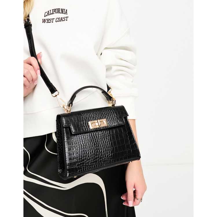 ASOS DESIGN cross body bag with buckle detailing and detachable