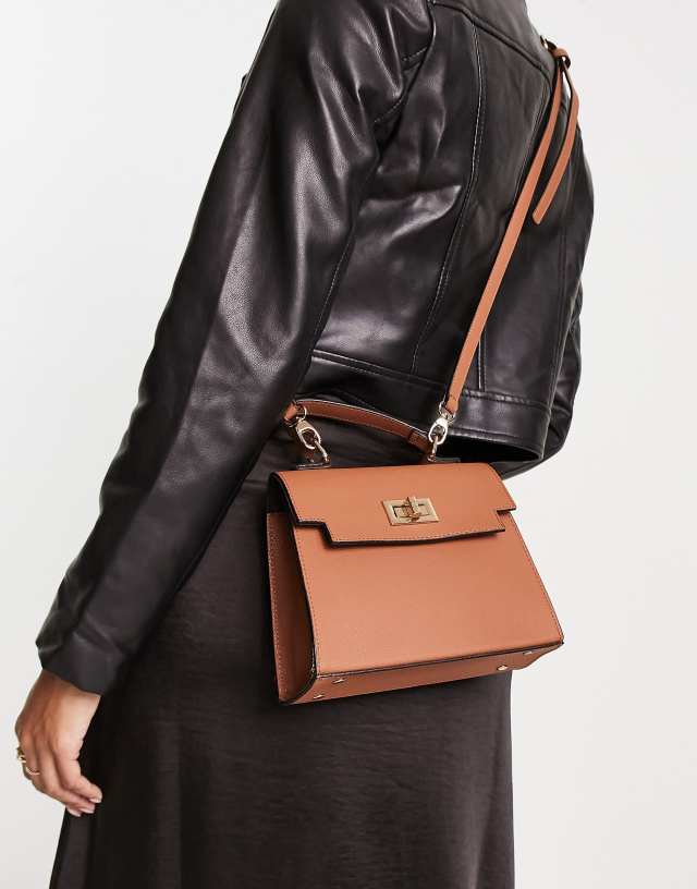 ASOS DESIGN lock detail bag with top handle and detachable crossbody strap in mid brown