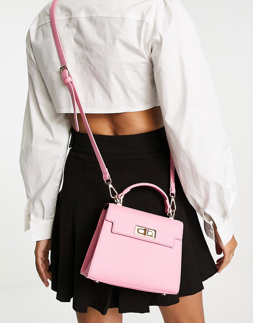 ASOS DESIGN lock detail bag with top handle and detachable crossbody strap in pink