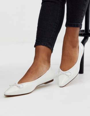 white pointed ballet flats