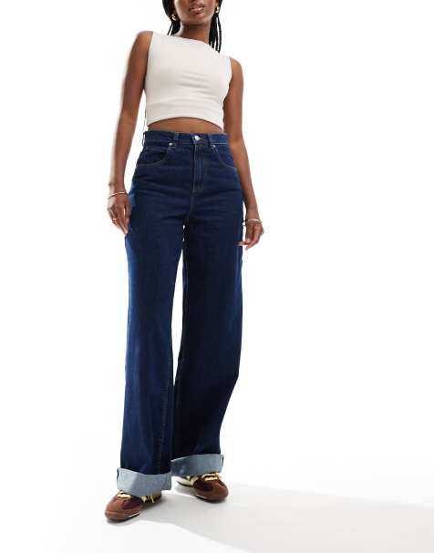 ASOS DESIGN – Locker geschnittene Jeans in tintenblauer Waschung mit breitem Umschlagsaum - view 1