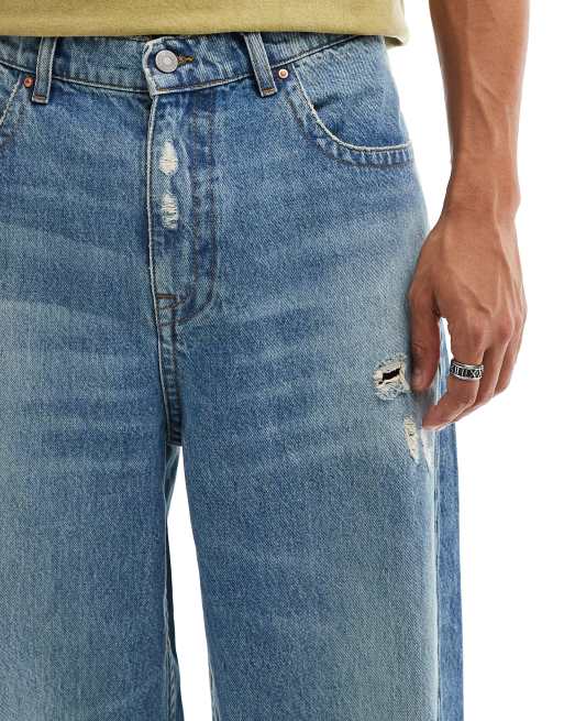 ASOS DESIGN – Locker geschnittene Jeans in verwaschenem Hellblau mit Zierrissen, 4 von 5