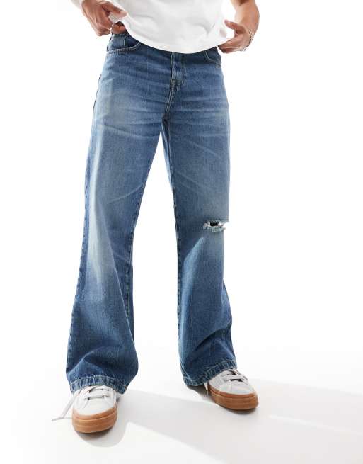 ASOS DESIGN – Locker geschnittene Jeans mit weitem Saum in verwaschenem Mittelblau, 3 von 5
