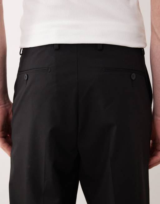 ASOS DESIGN – Locker geschnittene, schmal zulaufende Anzughose aus Twill in Schwarz, 5 von 5