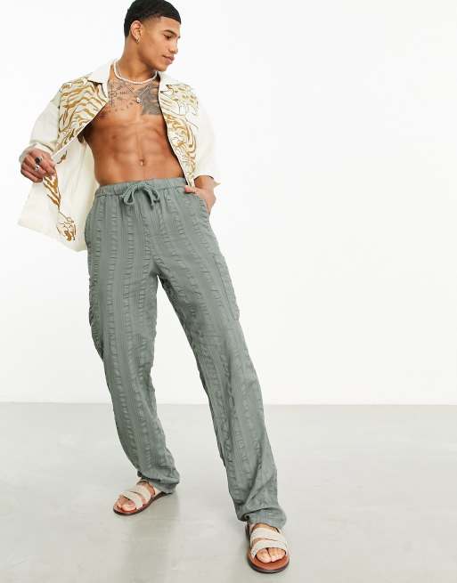 ASOS DESIGN – Locker geschnittene, strukturierte Hose in Grün