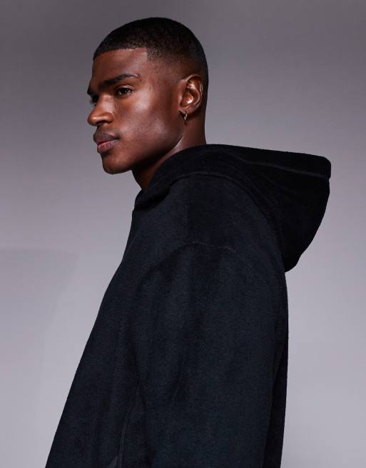 ASOS DESIGN – Locker geschnittener Fleece-Kapuzenpullover in Schwarz, Kombiteil, 4 von 5