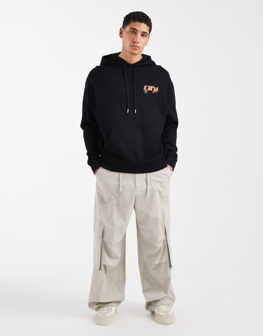 ASOS DESIGN – Locker geschnittener Kapuzenpullover in Schwarz mit Auto-Print, 2 von 5