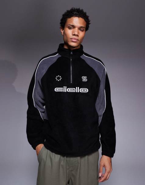 ASOS DESIGN – Locker geschnittenes Fleece-Sweatshirt in Schwarz mit kurzem Reißverschluss, Stehkragen, Brust-Print und Kontrasteinsätzen - view 1