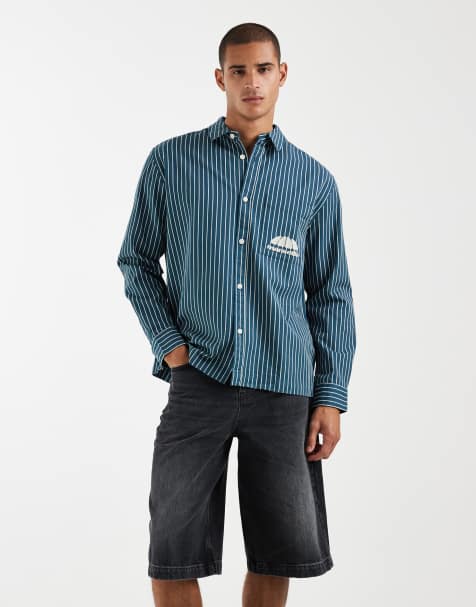 ASOS DESIGN – Locker geschnittenes Hemd aus Twill in Blau gestreift mit Stickerei auf Brusthöhe - view 1
