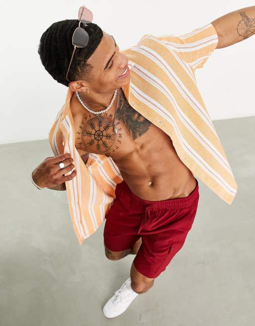 ASOS DESIGN – Locker geschnittenes Hemd in Orange mit Struktur, Streifen und Reverskragen