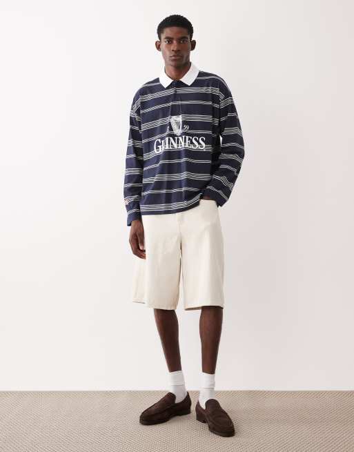 ASOS DESIGN – Locker geschnittenes Polohemd in Marineblau mit „Guinness“-Print, 2 von 5