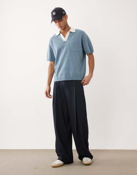 ASOS DESIGN – Locker geschnittenes Strick-Polohemd in Blau mit eingekerbtem Ausschnitt und Brusttasche - view 1