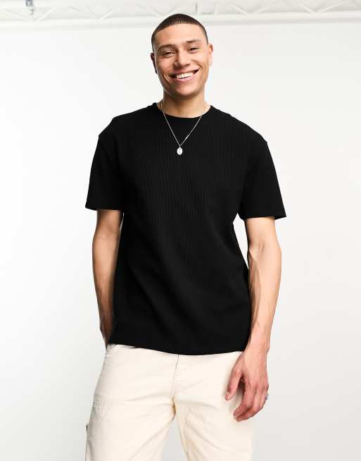 ASOS DESIGN – Locker geschnittenes T-Shirt in Schwarz mit Waffelstruktur
