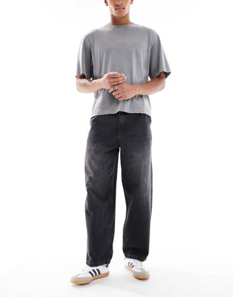 ASOS DESIGN – Locker sitzende Jeans im Jogginghosen-Stil mit geradem Schnitt, in schwarzer Waschung - view 1