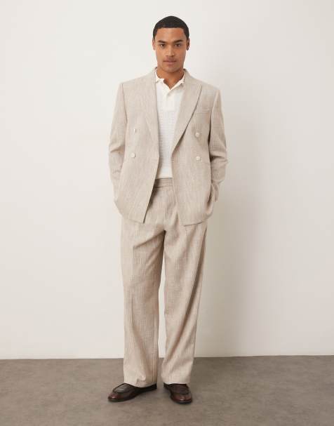 ASOS DESIGN – Lockere, schmal zulaufende Anzughose in Beige aus gesprenkeltem Stoff - view 1