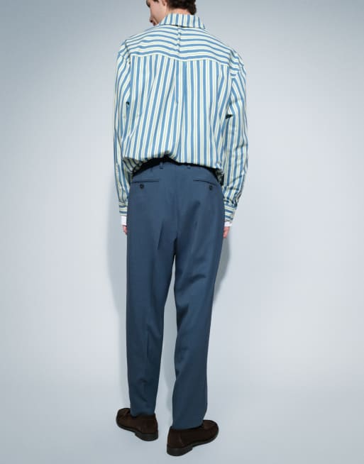 ASOS DESIGN lockere, schmal zulaufende Anzughose in Dunkelblau, 2 von 5