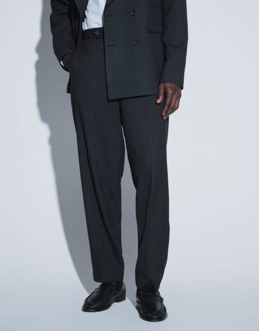 ASOS DESIGN lockere, schmal zulaufende Anzughose in Schwarz mit Hahnentrittmuster, 2 von 5