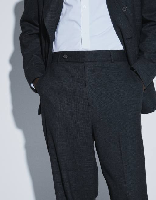 ASOS DESIGN lockere, schmal zulaufende Anzughose in Schwarz mit Hahnentrittmuster, 4 von 5